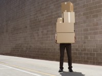 delivery-person carrying boxes